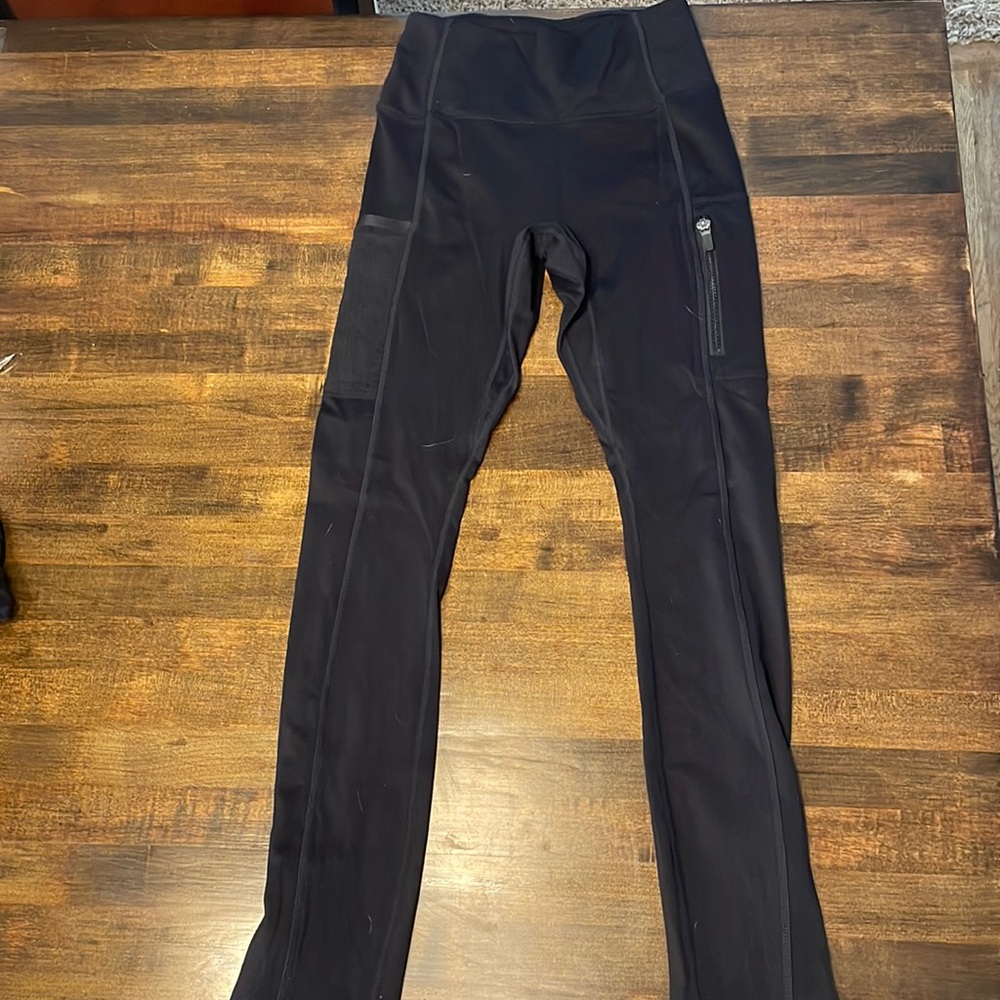 Black XS fabletics leggings with zipper detailings